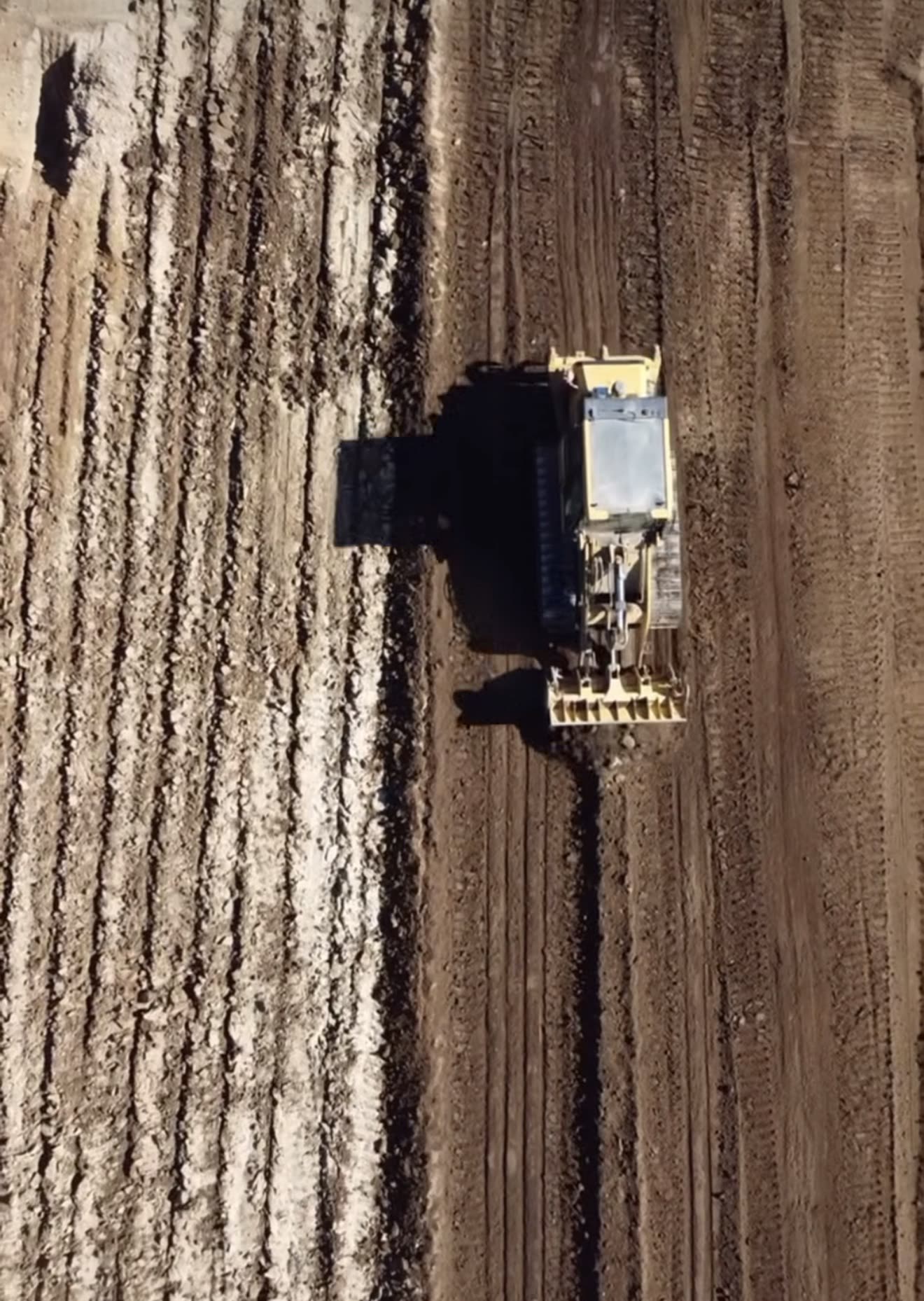 Aerial view of fire trail and pad cut by dozer